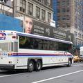 CoachUSA / Shortline / Hudson Transit Lines MCI 70329 @ 42 St & 5 Av. Photo taken by Brian Weinberg, 7/28/2006.