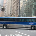 New York Airport Service MCI 102A2 148 @ 42 St & 5 Av. Photo taken by Brian Weinberg, 7/28/2006.