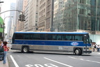 New York Airport Service MCI 102A2 148 @ 42 St &amp; 5 Av. Photo taken by Brian Weinberg, 7/28/2006.