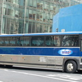 New York Airport Service MCI 102A2 148 @ 42 St & 5 Av. Photo taken by Brian Weinberg, 7/28/2006.