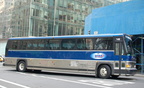 New York Airport Service MCI 102A2 148 @ 42 St &amp; 5 Av. Photo taken by Brian Weinberg, 7/28/2006.