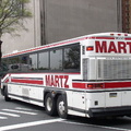 Martz Trailways MCI 102-DL3 M550 @ Battery Pl & Greenwich St. Photo taken by Brian Weinberg, 05/05/2003.