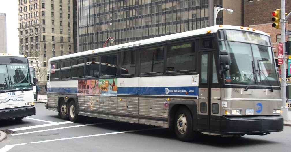 MTA 1999 MCI 102-DLW3SS 2068 @ Greenwich St &amp; Morris St. Photo taken by Brian Weinberg, 05/05/2003.