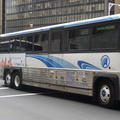 Academy 2001 MCI D4000 Cruiser 8563 @ Greenwich St & Morris St. Photo taken by Brian Weinberg, 05/05/2003.