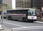 Suburban MCI 102-DL3 8828 @ Greenwich St &amp; Morris St. Photo taken by Brian Weinberg, 05/05/2003.
