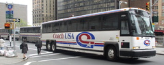 Suburban MCI 102-DL3 37070 @ Greenwich St &amp; Morris St. Photo taken by Brian Weinberg, 05/05/2003.