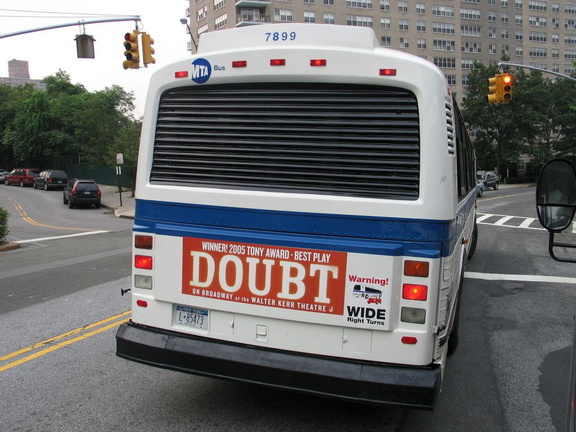 MTA Bus MCI Classic 7899 @ Kappock St (Riverdale, NY). Photo taken by Brian Weinberg, 7/14/2005.