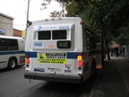 NYCT Orion V 6033 II @ Corlear Ave and 231 St (Bx7). Note that the rear of the bus is painted white instead of black. Photo take