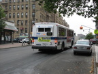 NYCT Orion V 6033 II @ Kingsbridge Ave and 231 St (Bx7). Note that the rear of the bus is painted white instead of black. Photo