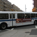 NYCT Orion V 6033 II @ Kingsbridge Ave and 231 St (Bx7). Note that the rear of the bus is painted white instead of black. Photo