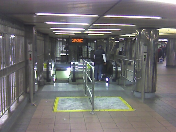 Reopened escalator @ 34 St - Herald Sq. This leads down to the NB platform from the 34 St mezzanine. Photo taken by Brian Weinbe