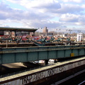 Long abandoned middle platform and current Canarsie-bound Atlantic Av (L) platform. Photo by Brian Weinberg, 11/27/2002. (179k)