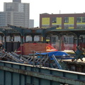 Long abandoned middle platform and current Canarsie-bound Atlantic Av (L) platform. Photo by Brian Weinberg, 11/27/2002. (112k)