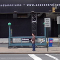 Man waits by subway entrance @ 59 St - CC (outside). Photo taken by Brian Weinberg, 02/02/2003. (86kb)
