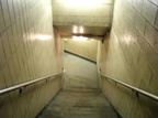 South Ferry (1/9). Stairs leading down to the inner loop. Station was closed due to 9/11. Photo taken by Brian Weinberg, 6/30/20