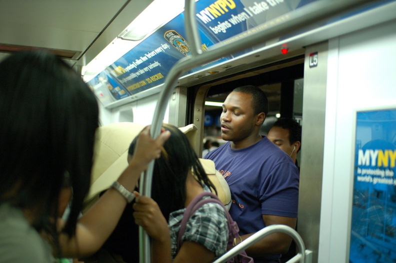 this guy had two large stuffed animals, and had a fight with the women behind him (not shown) who tried to squeeze on right after DSC_4220.jpg