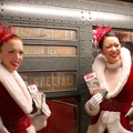 Rockettes Lauren Gaul, left, and Naomi Hubert ride the Arnines in service (incl. R-6 1300).