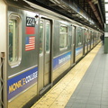 R-62A 2314 @ Times Sq - 42 St (1). Note the ad for Monroe College.