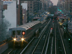 R-62A @ leaving 125 St southbound (1) on the Manhattan Valley viaduct. Photo taken by Brian Weinberg, 4/15/2004.