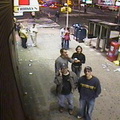 Still image from one of the Times Square WebCams. Brian Weinberg is in the foreground on the left with the hat and cellphone to