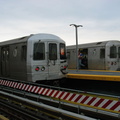 R-46 5792 and R-46 58?0 @ Coney Island-Stillwell Av (D/F/Q). Notice the newly painted end cap on 5792. Photo taken by Brian Wein