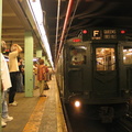 R-1 100 @ 71 St - Continental Av (in service on the F line / Centennial Celebration Special). Note the man with his hands on his