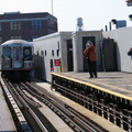 R-40 @ 39 Av (N/W). SubChatters Tuna Car and Brighton Beach Bob are on the platform. Photo taken by Brian Weinberg, 10/28/2004.