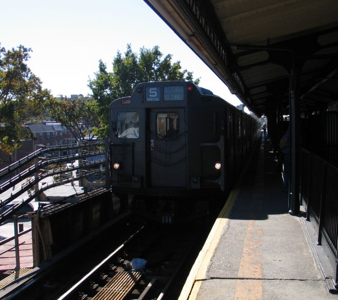 R-7A 1575 @ Astoria Blvd (N/W). Museum train is running in-service. Photo taken by Brian Weinberg, 10/28/2004.