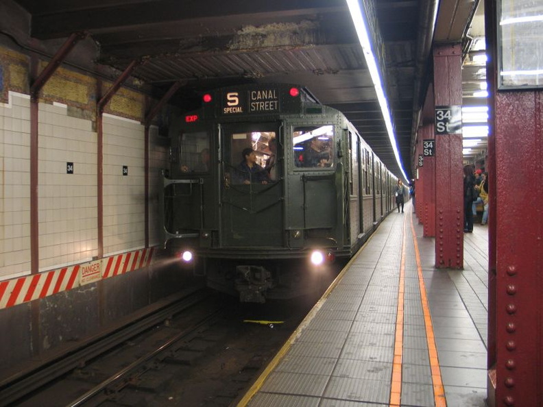R-1 100 @ 34 St - Herald Square (R/W). Museum train is running in-service. Photo taken by Brian Weinberg, 10/28/2004.