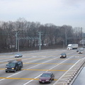 Northbound lanes @ New York State Thruway's New Rochelle Toll Barrier. The Northeast Corridor rail line is in the background.