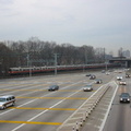 Northbound lanes @ New York State Thruway's New Rochelle Toll Barrier. The Northeast Corridor rail line is in the background, wi