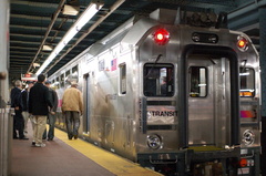 NJ Transit Multi-level Cab 7002 @ New York Penn Station (Inaugural Revenue Run). Photo taken by Brian Weinberg, 12/11/2006.