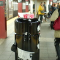 5 Av - Bryant Park (7). Note the newspapers stuck to the freshly painted garbage can. By the next day, it was repainted and the