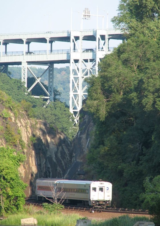 Shoreliner I cab 6111 @ Marble Hill at the rock cut (MNCR Hudson Line). Photo taken by Brian Weinberg, 8/17/2005.