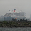 Queen Mary 2, departing NYC, as seen from Hoboken Terminal. Photo taken by Brian Weinberg, 9/14/2005.
