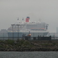 Queen Mary 2, departing NYC, as seen from Hoboken Terminal. Photo taken by Brian Weinberg, 9/14/2005.
