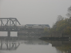 Amtrak P32DM-AC 717 (Train #71) @ Spuyten Duyvil Swing Bridge (Inwood Movable Bridge). Photo taken by Brian Weinberg, 11/6/2005.