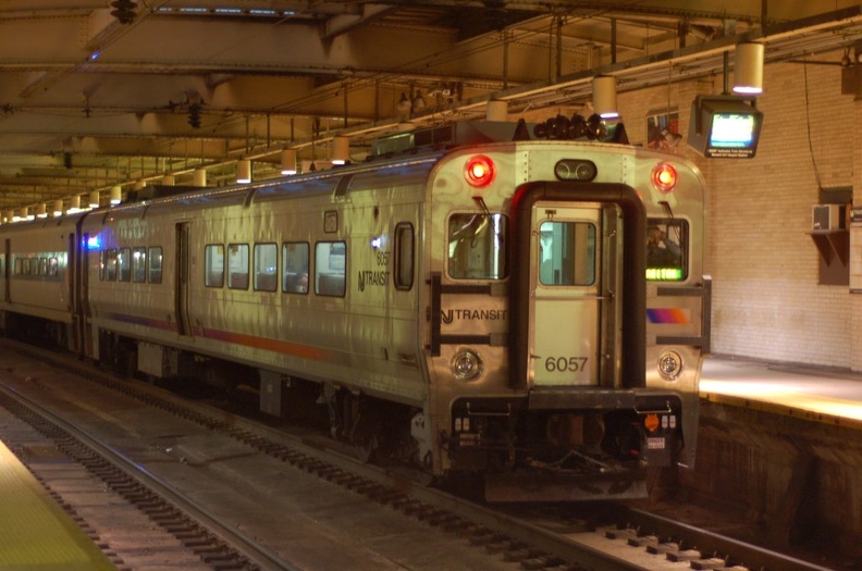 NJT Comet V Cab 6057 @ Newark Penn Station. Photo taken by Brian Weinberg, 12/18/2005.