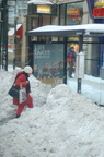 Snowed in bus shelter @ 34 St &amp; 5th Ave. Photo taken by Brian Weinberg, 2/13/2006.