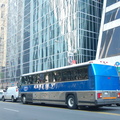 New York Airport Service MCI 102-A2 149 @ 42 St mid-block between 5 Av and 6 Av. Photo taken by Brian Weinberg, 6/30/2006.