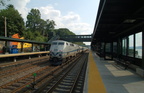 Metro-North Commuter Railroad (MNCR) P32AC-DM 215 @ Riverdale (Hudson Line). Photo taken by Brian Weinberg, 7/9/2006.