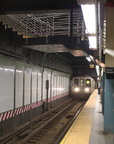 R-40 4285 @ Times Square - 42 St (W) - southbound platform, with the new staircase overhead.