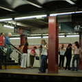 Passengers @ 47-50 Sts - Rockefeller Center (F/V) - downtown platform. Photo taken by Brian Weinberg, 8/4/2006.