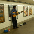 Musician @ 14 St corridor connecting 14 St (1/2/3) and 14 St (F/V) / 6 Av (L). Photo taken by Brian Weinberg, 8/4/2006.