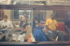 Passengers on an adjacent R-46 (R) train admiring R-160B 8713 @ Broadway BMT. Note: first revenue run of the R-160 fleet as part