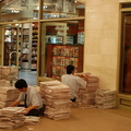 Newspapers being prepared for sale at Hudson News @ Grand Central Terminal. Photo taken by Brian Weinberg, 8/30/2006.