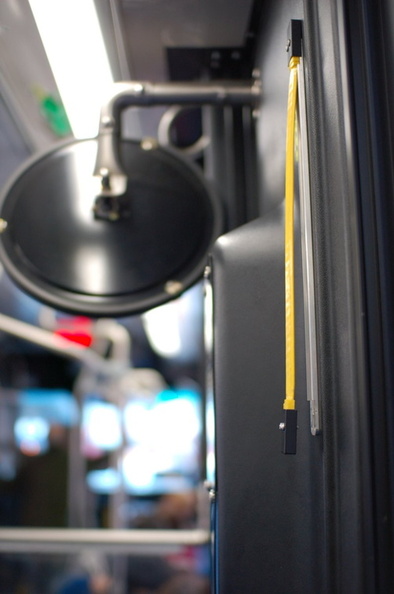 NYCT Orion VII 6635 (interior) @ 5 Av & 32 St (M5). Note the unscrewed stop-request tape. Photo taken by Brian Weinberg, 10/17/2006. DSC_8136.jpg