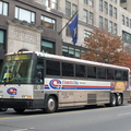 CoachUSA / Suburban MCI 8825 @ 42 St between 5 Av and 6 Av. Photo taken by Brian Weinberg, 11/27/2006.