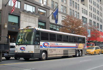 CoachUSA / Suburban MCI 8825 @ 42 St between 5 Av and 6 Av. Photo taken by Brian Weinberg, 11/27/2006.