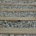 Recreated rails and ties along a section of the Staten Island North Shore right-of-way behind the restaurant R. H. TUGS. Photo t